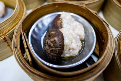 High angle view of bread in basket on table