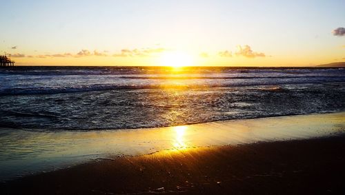 Scenic view of sea at sunset