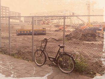 Bicycle parked in front of building