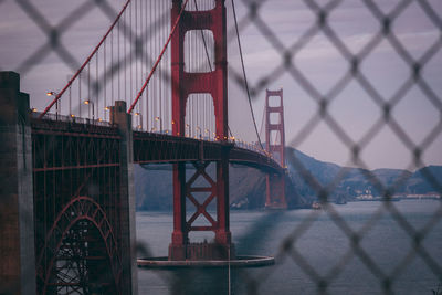 View of bridge against cloudy sky