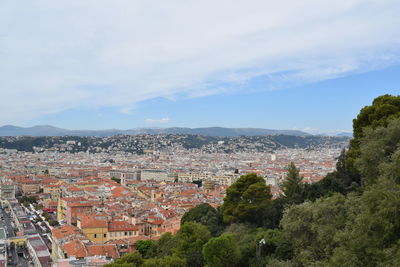 Aerial view of townscape against sky