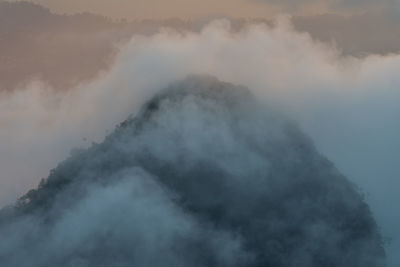 Low angle view of fog against sky