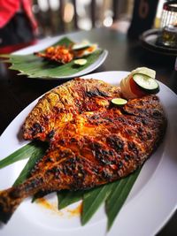Close-up of served food on table
