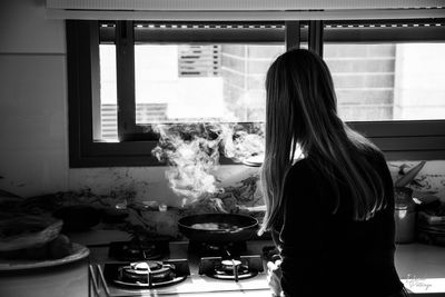 Woman preparing food at home