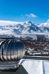 Aerial view of snowcapped mountains against sky