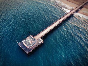 High angle view of commercial dock by sea