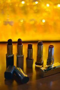 Close-up of lipsticks on table