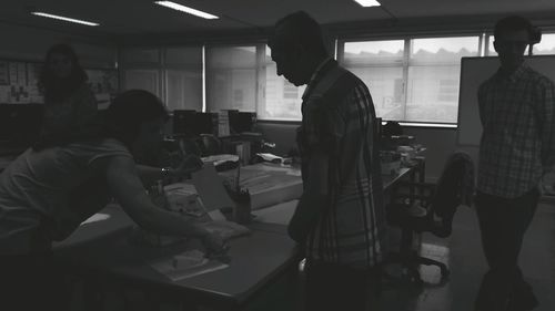 Young man working on table