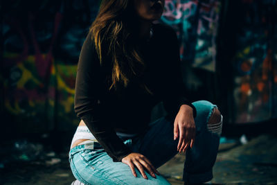 Close-up of woman standing on ground