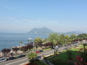 High angle view of road by sea against sky