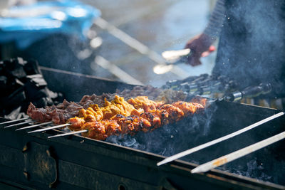 Close-up of meat on barbecue grill