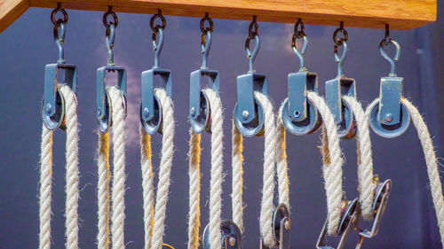 Low angle view of clothes hanging on metal