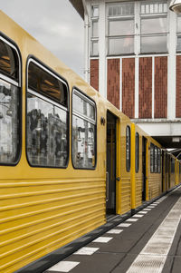Train in city against sky