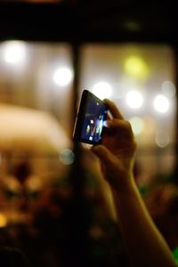 Close-up of hand holding smart phone