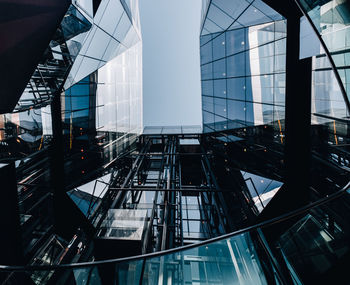 Modern buildings against sky in city