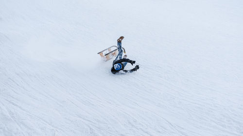 Man falling on slope