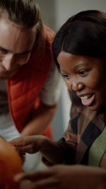 Close-up of young woman using mobile phone