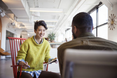 Entrepreneurs discussing in office