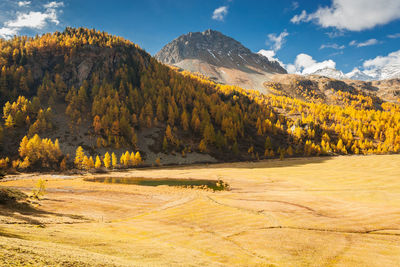 Scenic view of mountains against sky during autumn