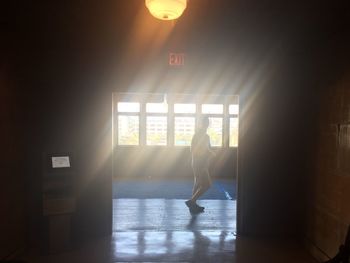 Woman in corridor of building