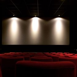 Empty chairs in illuminated room