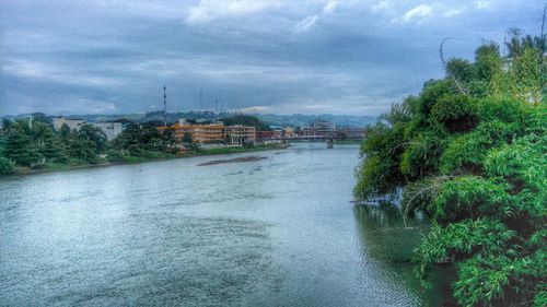 View of river against cloudy sky