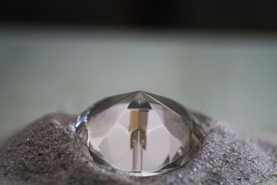 Close-up of wedding rings on table