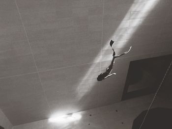 High angle view of woman swimming in pool