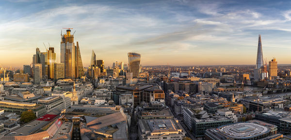 Modern buildings in city against sky