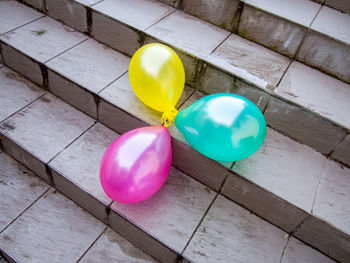 High angle view of colorful balloons on steps