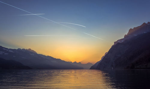 Scenic view of mountains against sky during sunset