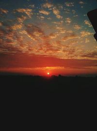 Scenic view of silhouette landscape against sky during sunset