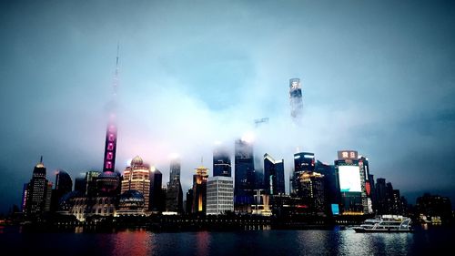 Low angle view of illuminated city at night