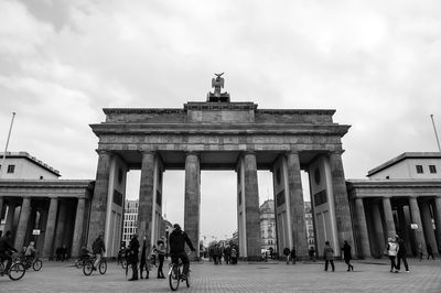 Group of people in front of historical building