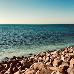 Scenic view of sea against clear sky