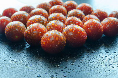 Close-up of wet fruits on table