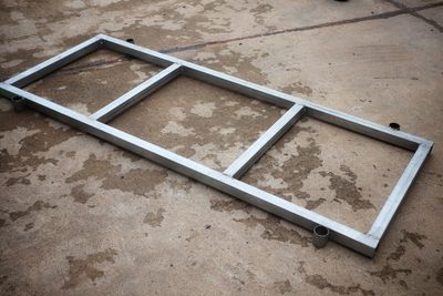 High angle view of metal on floor in building