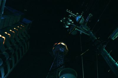 Low angle view of illuminated building at night