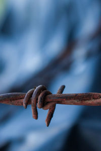 Close-up of rusty barbed wire