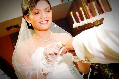 Close-up of happy woman with baby dress