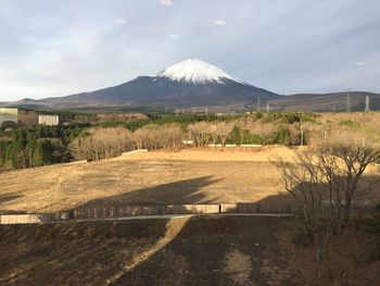 View of landscape against cloudy sky