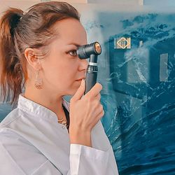 Portrait of woman holding camera