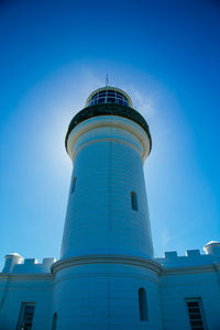 Low angle view of tower against blue sky