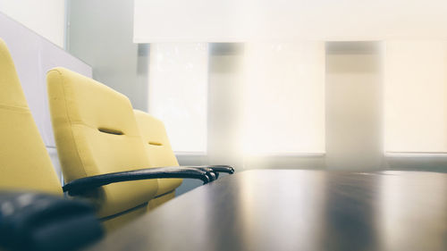 Close-up of empty seats on table at home
