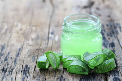 Close-up of aloe vera on wooden table