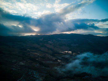 Aerial view of dramatic landscape against sky