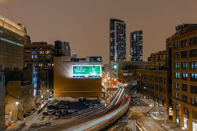 View of traffic on road at night