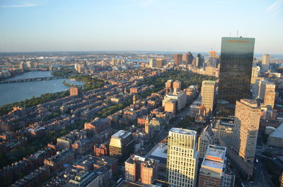 High angle view of modern buildings in city against sky