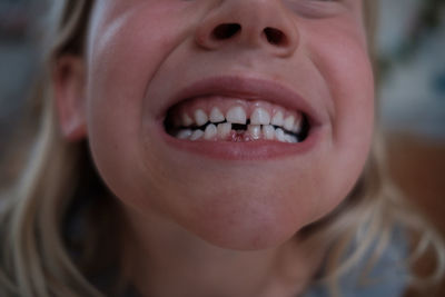 Close-up portrait of smiling girl