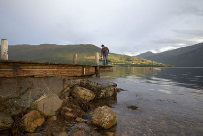 Fisherman working at dusk in norway